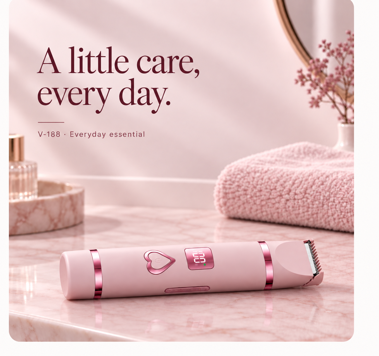 Pink V-188 resting fully flat on a marble countertop, separate from a folded pink towel
